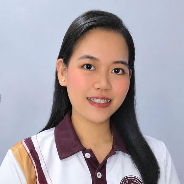 Smiling woman in professional attire representing The VA Bar.